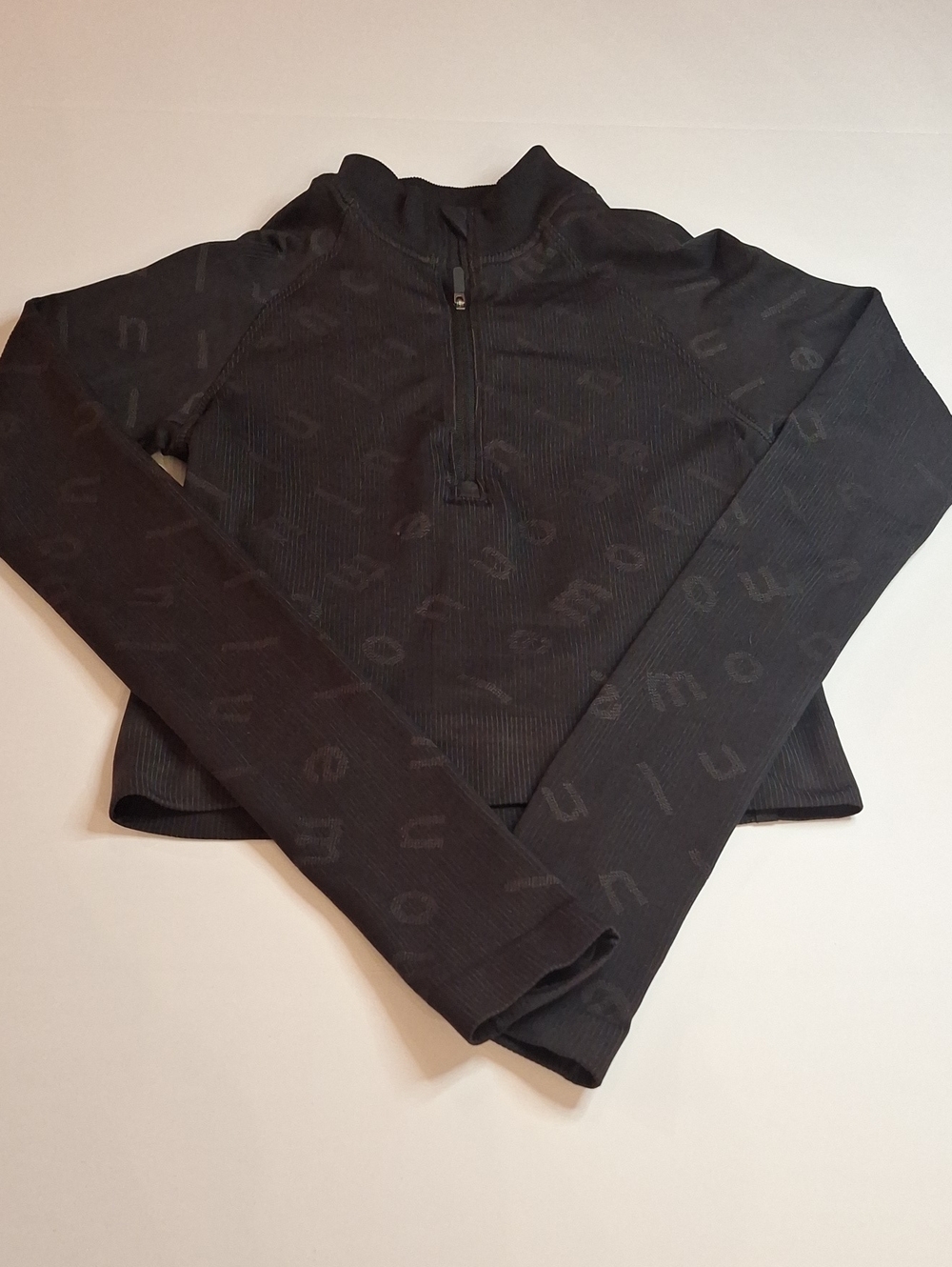 #914 Lululemon 1/4 zip With Spellout Size 2